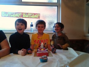 Very happy and proud birthday boy :-) with his brothers